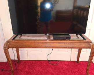 Element TV sitting on Sofa Table