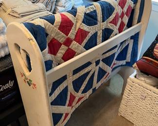 Quilt rack with vintage quilt
