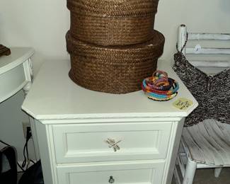White nightstand and stacking baskets