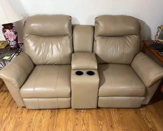 And matching dual recliner w/ storage console!