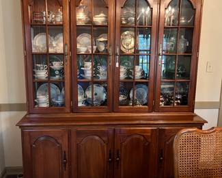 Cherry lighted Hutch. Maybe Harden which is Dining room table