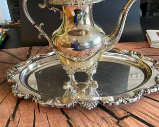 Lots of beautiful silver-plate serving pieces, including Christofle