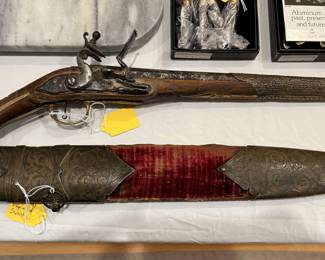 Antique Ottoman sword and antique Persian flint lock pistol