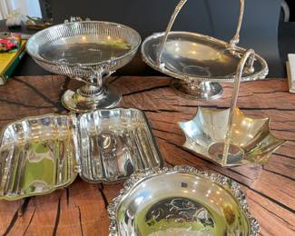 Lots of beautiful silver-plate serving pieces, including Christofle