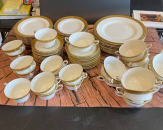 Royal Worcester C1393 porcelain dinnerware
11 dinner plates
11 salad plates
11 dessert plates
12 cups and saucers
12 cream soups and saucers