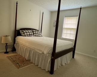 Now, I really like this queen bed. It was bought maybe in the 90s. Maybe cherry? It's solid.