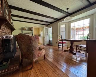 Wing back chair, very old, but has been reupholstered and comfy. 