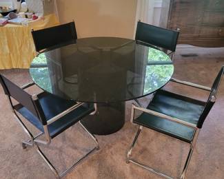 Nice Dinning Room Set .Dark Smoked Glass Top With Leather / Chrome Chairs 