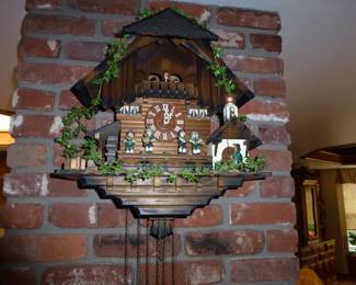 A very cute cuckoo clock that works and sounds great! Keeps time too! 3 weights to this beauty!