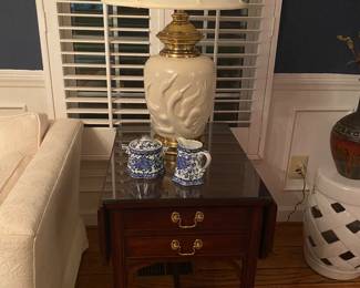 Matching Henkel Harris end tables with protective glass tops.