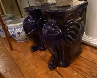 Matching elephant stands.