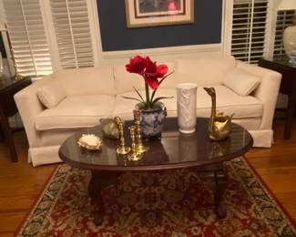 Nice coffee table with protective glass top.