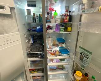 Whirpool side by side refrigerator/freezer. $300