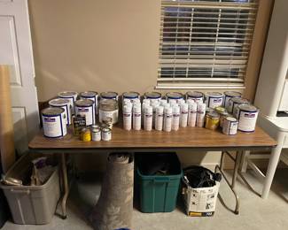 Wood finishing stains, glazes, top coats and toners.  $1 per can. Bringing more items out tomorrow. 