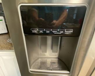 Whirpool side by side refrigerator/freezer. $300