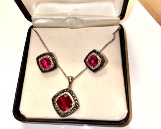Fred Meyer Sterling Silver and Cushion Created Ruby with Black and White Diamond Accents Pendant Necklace with Matching Earrings