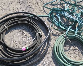 Lot 337. Three garden hoses
