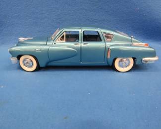 Lot 69. Road Signature 1948 Tucker Torpedo Sedan.&nbsp; 1:18 scale die-cast car.