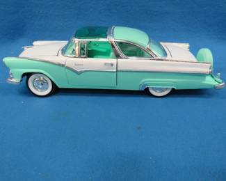 Lot 70. Road Tough 1955 Ford Fairlane Crown Victoria. 1:18 scale die-cast car.&nbsp; Small scratches on the hood.