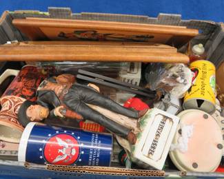Lot 225. Lots of collectibles including Jesse James glass decanter, Schlitz Beer mug, and more