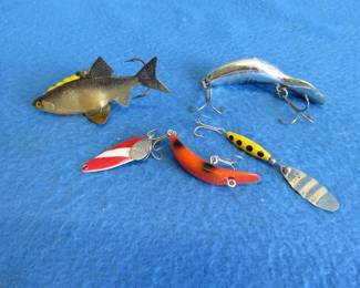 Lot 413. Four vintage lures: