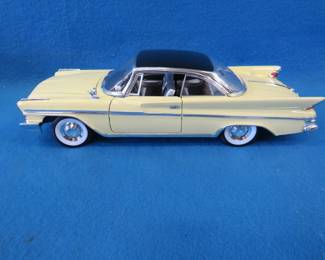 Lot 294. Road Deluxe Ed 1961 DeSoto Adventurer.&nbsp; 1:18 scale die-cast car.&nbsp; Includes original box.