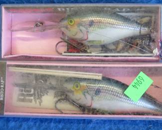 Lot 414. Rapala 3" Risto Rap in a box marked RR-8 SD in excellent condition with papers, Rapala 2 1/2" Risto Rap in a box in poor condition with papers