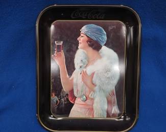 Lot 77. Vintage Coca-Cola serving tray created from a 1925 advertisement, printed in 1973