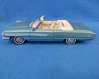 Lot 292. Sun Star 1964 Ford Galaxie 500 convertible.&nbsp; 1:18 scale die-cast car.&nbsp; Includes original box.