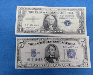 Lot 50. Series 1934 C $5.00 silver certificate and a 1957 B $1.00 silver certificate