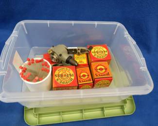 Lot 419. Ohaus powder dispenser and vintage boxes of gun cleaning patches most have patches still
