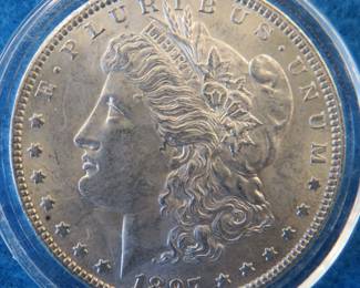 Lot 261. 1897 P Morgan silver dollar
