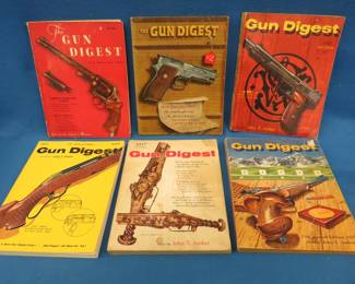 Lot 79. Six old Gun Digests. 1951, 1955, 1957, 1958, 1959, and 1963