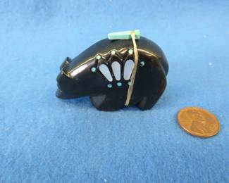 Lot 295. Zuni fetish carving with inlays by Donna Suitza.