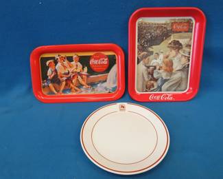 Lot 427. Two reissued Coke trays and a 20th Century Fox plate