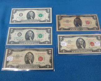 Lot 148. Five $2.00 bills including three red seal