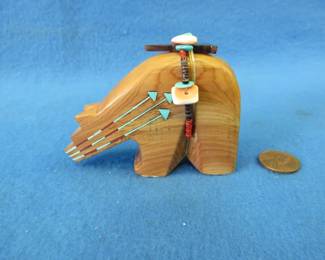 Lot 299. Zuni wooden carved fetish figurine with inlays by Tony Laiwakete
