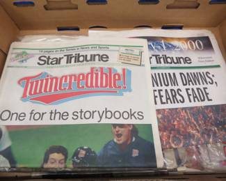 Lot 215. Old newspapers from historic events in the U.S.