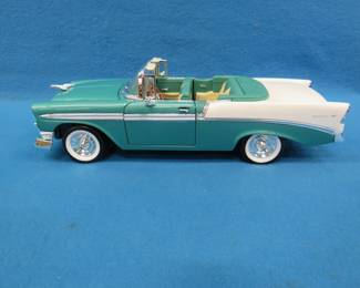 Lot 67. Road Signature 1956 Chevrolet Bel Air Convertible.&nbsp; 1:18 scale die-cast car.&nbsp; Includes original box.
