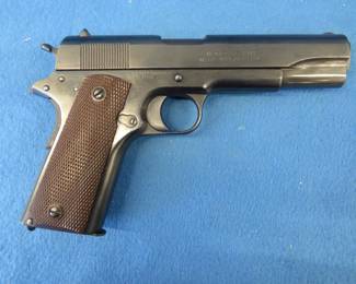 Lot 26. Remington Model 1911 45 cal. semi-auto pistol.&nbsp; Ser. No. 610037.&nbsp; Includes 1917 leather holster.