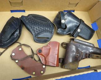 Lot 183. Five leather holsters
