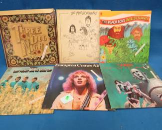 Lot 30. 12 albums including Peter Frampton, Beach Boys, and more