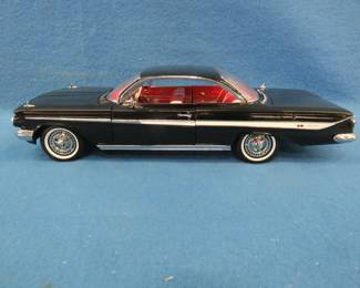 Lot 170. Sun Star 1961 Chevrolet Impala Convertible.&nbsp; 1:18 scale die-cast car.&nbsp; Includes original box.
