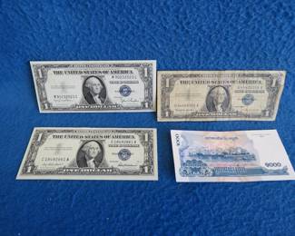 Lot 313. Three $1.00 Silver Certificates