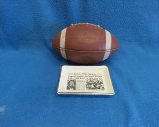 Lot 224. OJ Simpson football,  Ceramic tray with newspaper print of OJ