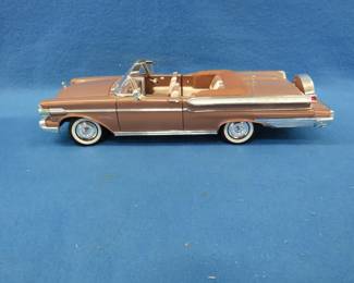 Lot 173. Road Signature 1957 Mercury Turnpike Cruiser.&nbsp; 1:18 scale die-cast car.&nbsp; Includes original box.