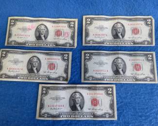 Lot 312. Five 1953 $2.00 bills:   See picture for writing on one