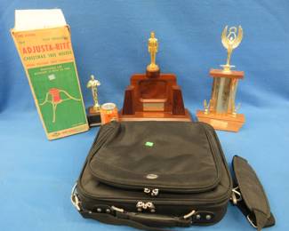 Lot 138. Trophies, computer bag, and a Christmas tree holder