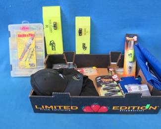 Lot 269. Fishing tackle including planer boards, new lures, muskie jigging kit, and more