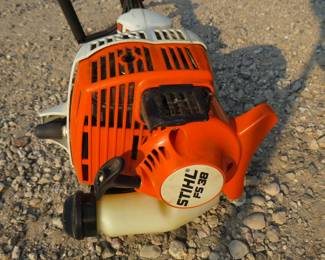 Lot 445. Stihl FS 38 weed whacker with compression